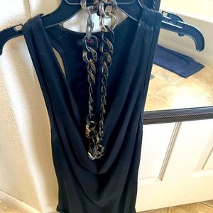 Black cowl neck sleeveless top with necklace. Size medium